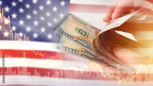 US dollars in hands with Am...