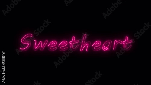 Sweetheart glowing pink neon text against a dark background creating a romantic and loving atmosphere.
