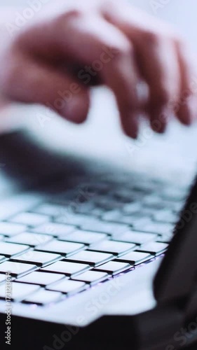hands typing on a keyboard