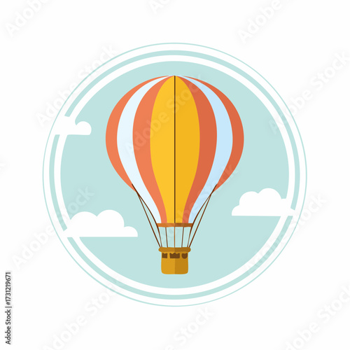 A colorful hot air balloon with orange, yellow, and white panels floating gently in the sky with a wicker basket below