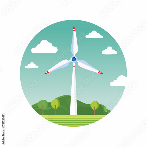 A tall white wind turbine with three blades featuring red tips stands amid green trees and hills under a blue sky dotted with white clouds