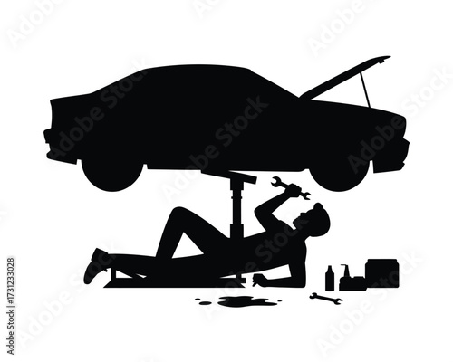 Black silhouette mechanic working under car with tools and fluids auto repair