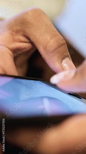 close up of female hands typing on smartphone
