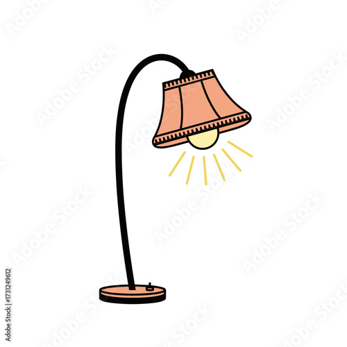 A charming desk lamp with a bent neck and a peach colored lampshade illuminating a warm glow.