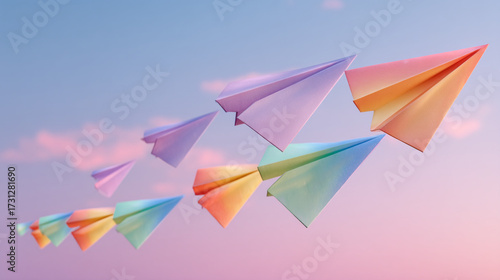 Free Download Paper airplanes flying in formation against a pastel colored sky - GFXLoad
