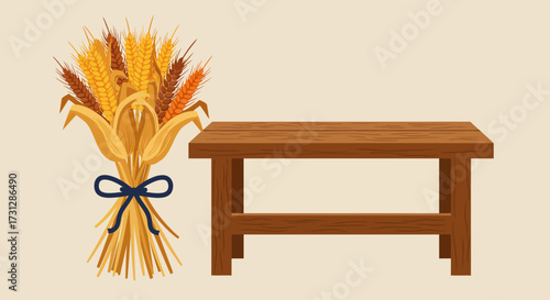 A bouquet of wheat tied with a blue ribbon stands beside a small brown wooden table
