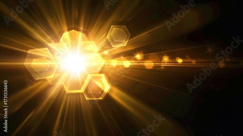 Cinematic golden light flare with radiant sunburst and hexagonal lens effect on black background