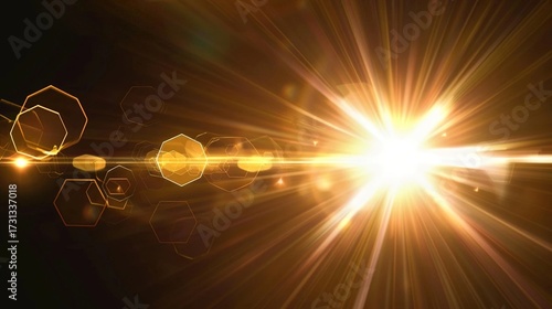 Cinematic golden light flare with radiant sunburst and hexagonal lens effect on black background