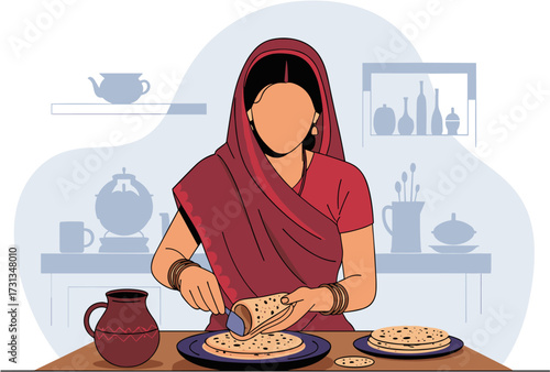 An Indian woman in traditional attire skillfully prepares fresh flatbreads in her kitchen, embodying cultural culinary practices.