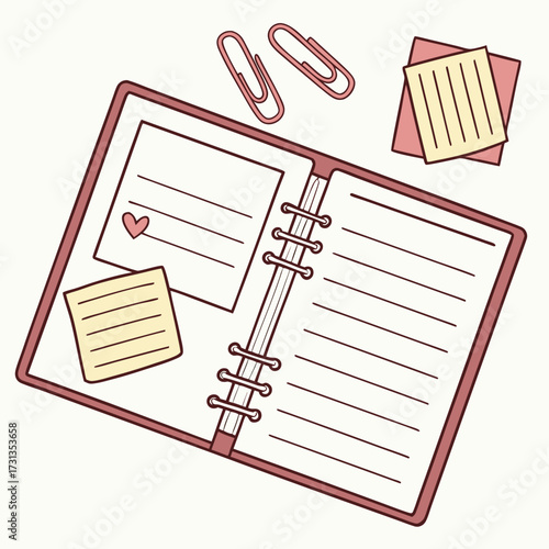 A charming pink open notebook with lined pages and a small heart doodle accompanied by two paper clips and sticky notes perfect for journaling or planning