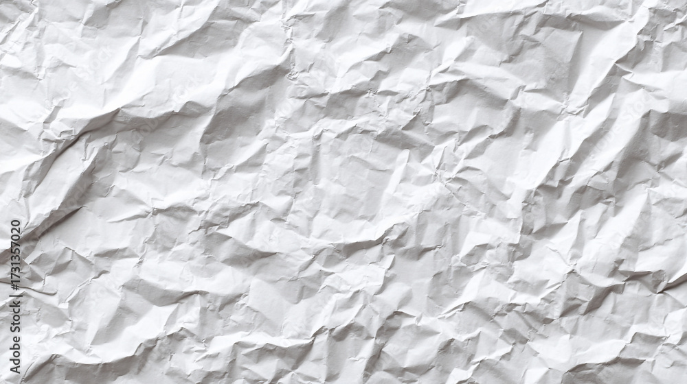 Fototapeta premium An abstract closeup of wrinkled white paper creating a dynamic and textured pattern perfect for backgrounds,