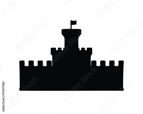 Silhouette of a majestic castle with a flag flying at the top