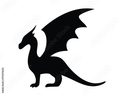 Silhouette of a majestic dragon standing proudly with wings spread