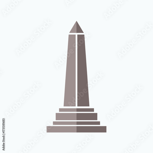 Tall monument with tiered base against a light background.
