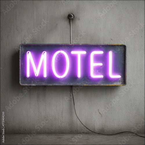 Neon motel sign glowing with purple light on rustic wall.