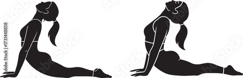 Two women performing cobra pose yoga silhouette