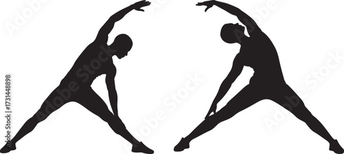 Two women stretching in a dynamic silhouette pose