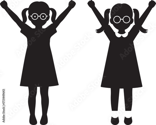 Two girls in silhouette with arms raised silhouette