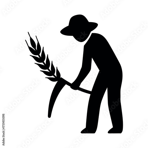 Silhouette of a farmer harvesting wheat with a scythe under a wide brimmed hat