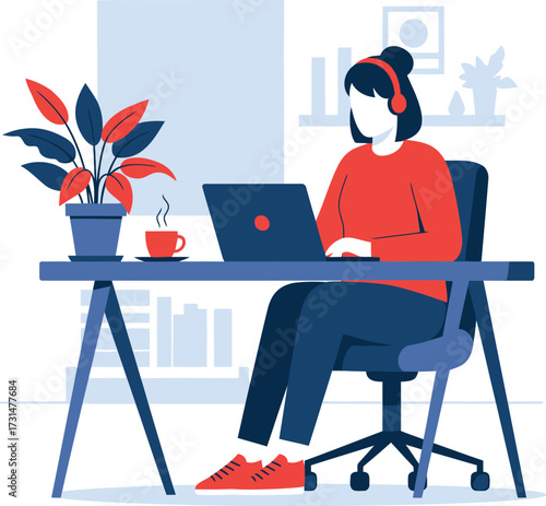 A woman wearing headphones sits at a desk with a laptop and a potted plant, working from home.