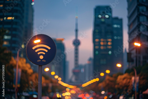 Cityscape at dusk featuring Wi Fi sign with blurred skyline, showcasing modern architecture and vibrant city lights