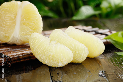 Fresh White Pomelo Segments Peeled on Wooden Surface - Thai Citrus Fruit