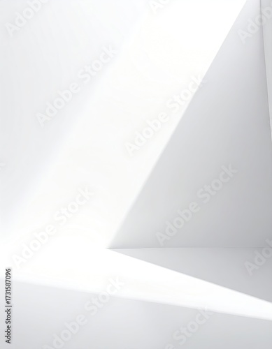 White room with angled light and shadow