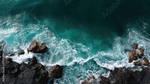 Ocean waves crashing rocks