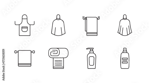 Collection of bathroom accessories and towels in a clean silhouette style