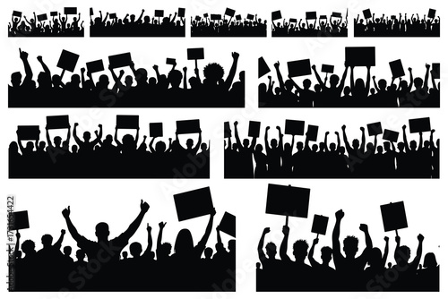 Silhouette crowd of people holding signs and raising fists