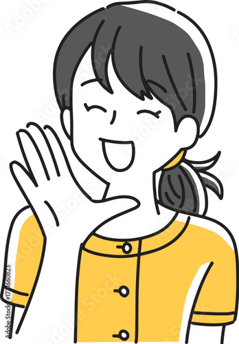 笑顔で挨拶するかわいい女性