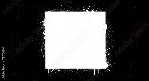 Square shape with white paint splatter isolated on a black background