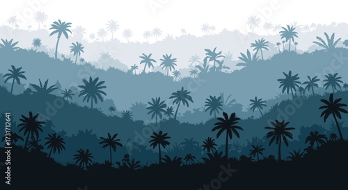 Misty tropical rainforest silhouette with dense palm trees stretching across the landscape.