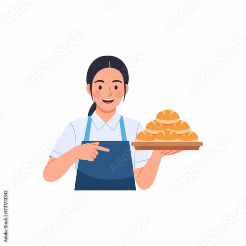 Baker woman holding a tray of bread, pointing with her finger.
