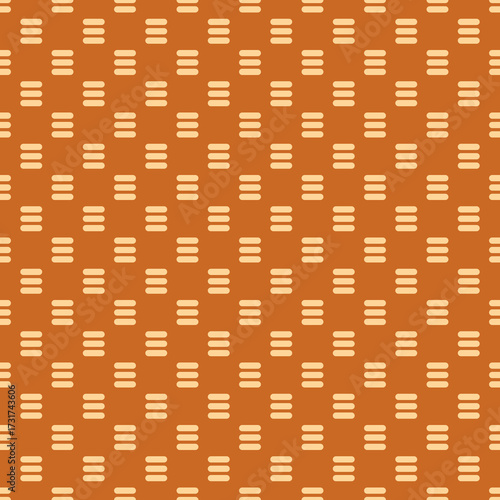 Seamless geometric pattern in amber and caramel colors