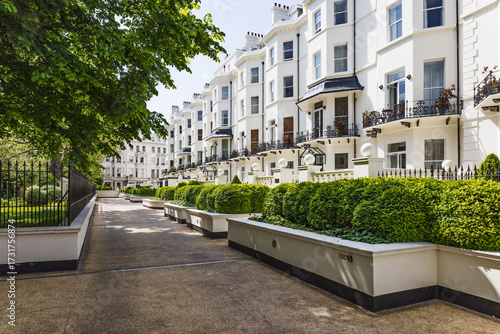 Elegant Georgian Terrace Row Houses and Pedestrian Promenade in Leafy Residential Street, London