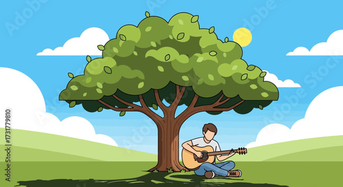 Young man playing guitar under a large tree on a sunny day.