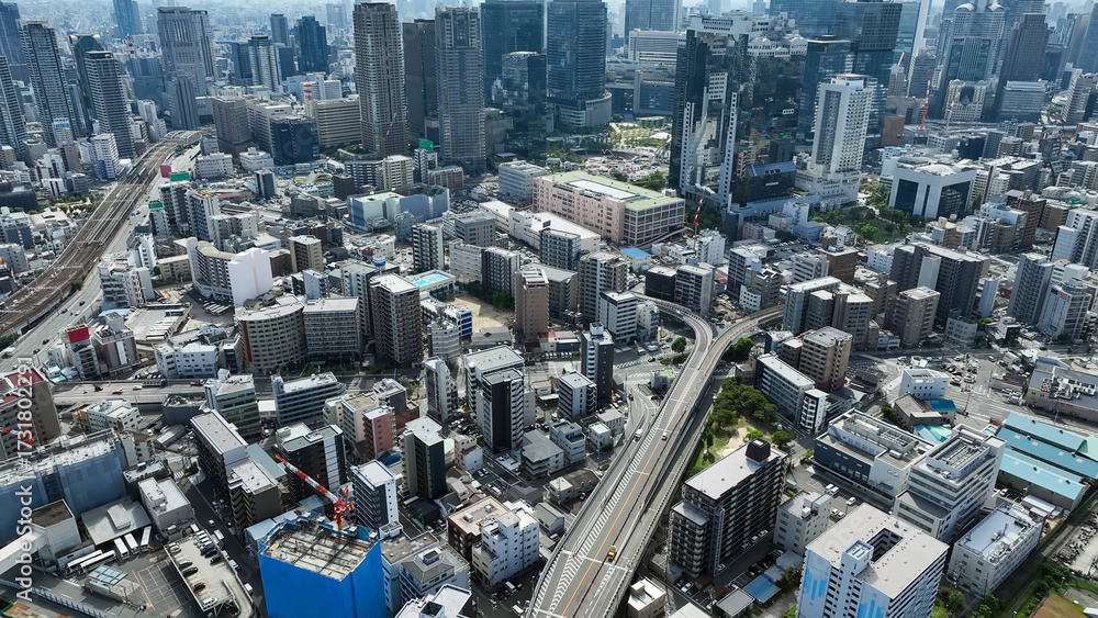 Fototapeta premium Drone aerial view of modern city and roads