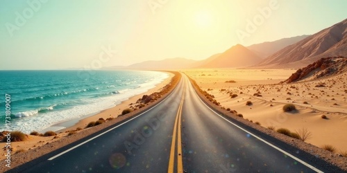 Asphalt ribbon unwinding towards a sun-kissed coastal desert landscape, promising adventure and escape