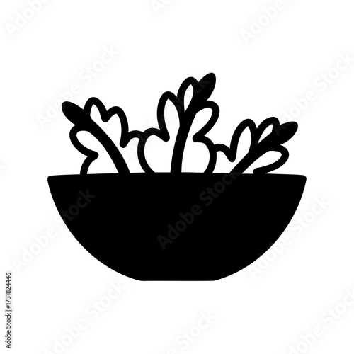 Black silhouette of a salad bowl full of fresh green leafy vegetables