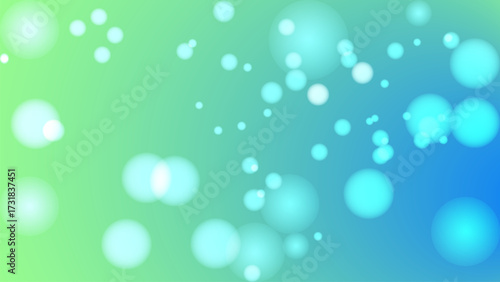 Vibrant abstract background with gradient of green to blue, featuring soft, glowing bokeh circles creating dreamy and calming effect