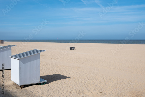 Panorama of beach huts and sand dunes, Oostende (Ostend), North Sea coast, Belgium.