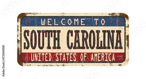 Welcome to South Carolina. An old worn sign with an inscription. Welcome metal plaque with rust elements