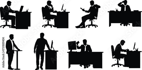Silhouette of businessman working at desk with laptop concept of office worker and business activity