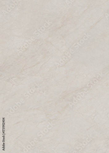 Close-up of a smooth, light-colored marble surface with subtle veining patterns