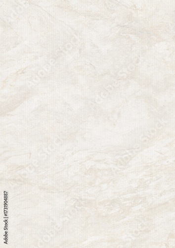 Close-up of a smooth, light-colored marble surface with subtle veining patterns