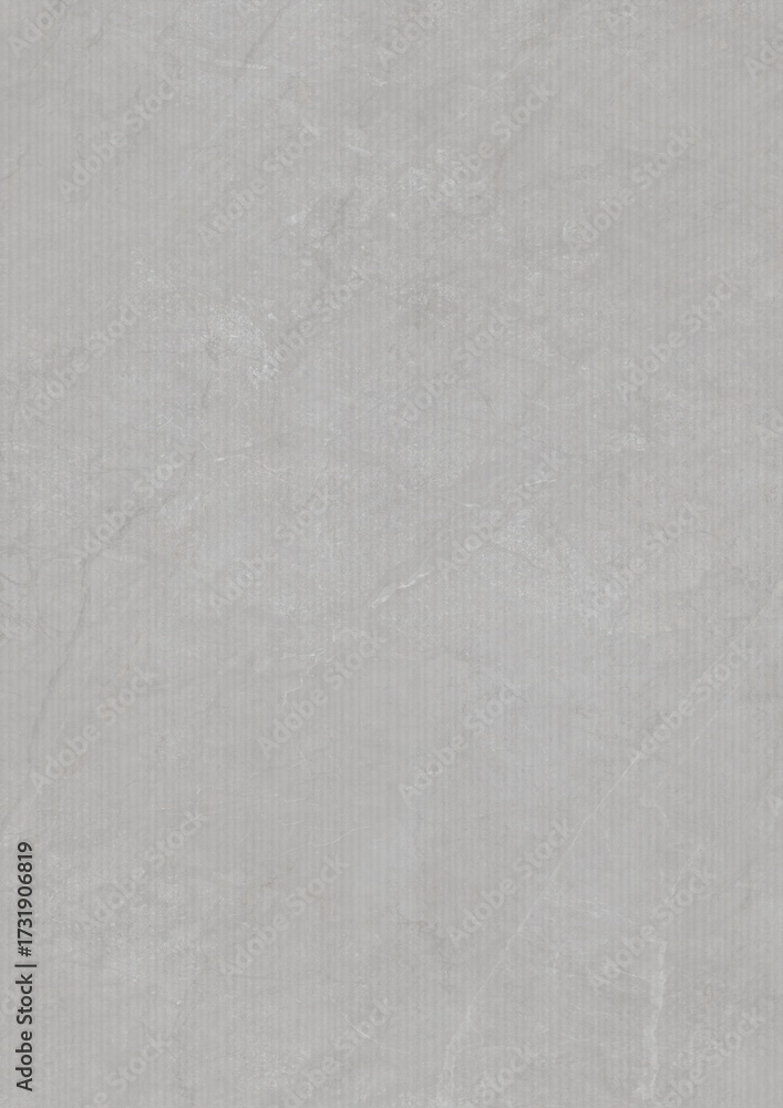 Fototapeta premium Close-up of a textured gray surface with subtle variations in tone and faint markings