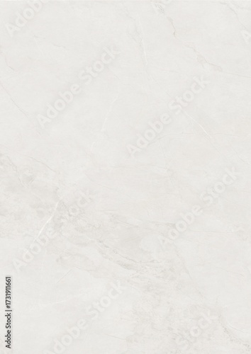 Close-up of a smooth, light gray marble surface with subtle veining patterns