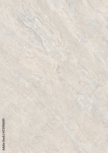 Close-up of a smooth, light-colored stone surface with subtle natural veining patterns.