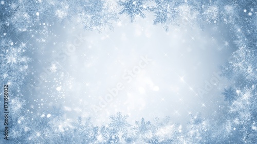 Elegant winter background with sparkling snowflakes and frosty blue design